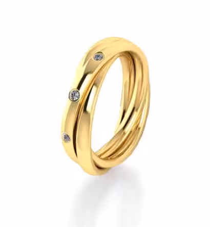 Trauringe selber schmieden: Goldene Eheringe mit Diamanten, handgefertigt.