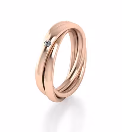 Trauringe selber schmieden – individuelle Goldringe mit Diamant.